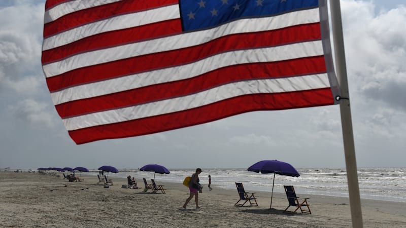 Lockdown-weary Americans hit the road to beaches for holiday weekend