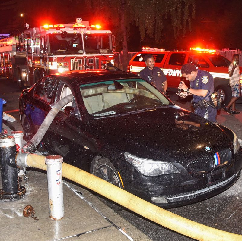 Firefighters Smash Windows of BMW Parked in Front of Hydrant, Run Hose through It