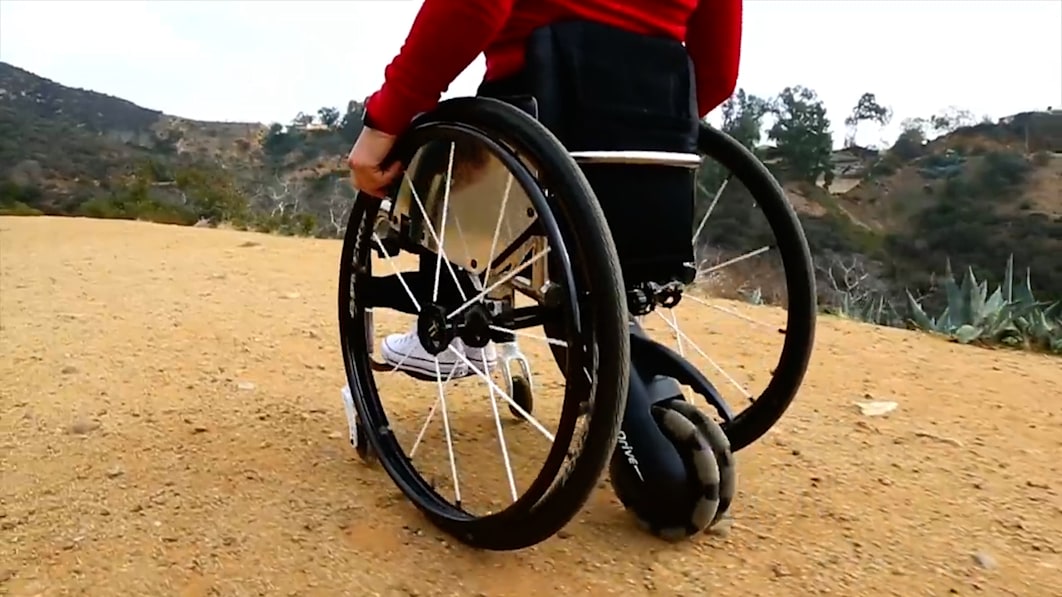 This system motorizes manual wheelchairs to reduce shoulder stress