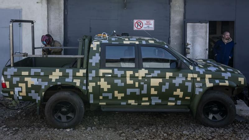 Ukrainian welders armor-plate donated vehicles to fight Russia