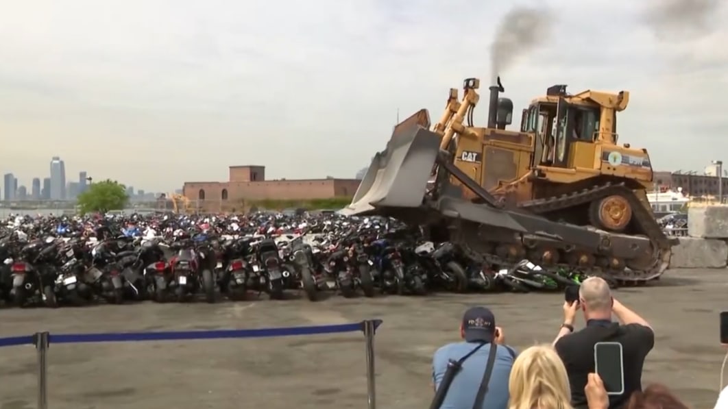 New York mayor bulldozes hundreds of illegal dirt bikes and ATVs